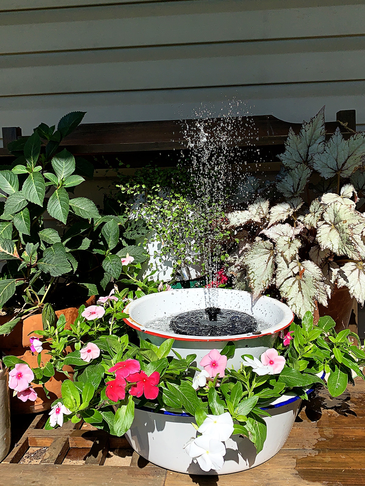 Solar powered water fountain made into a planter!