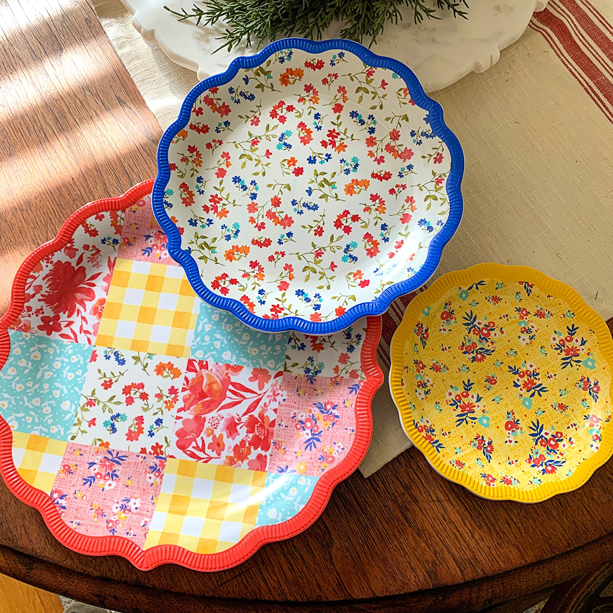 Pioneer Woman Patchwork Medley Melamine Dinner Plates used as a tiered serving tray.