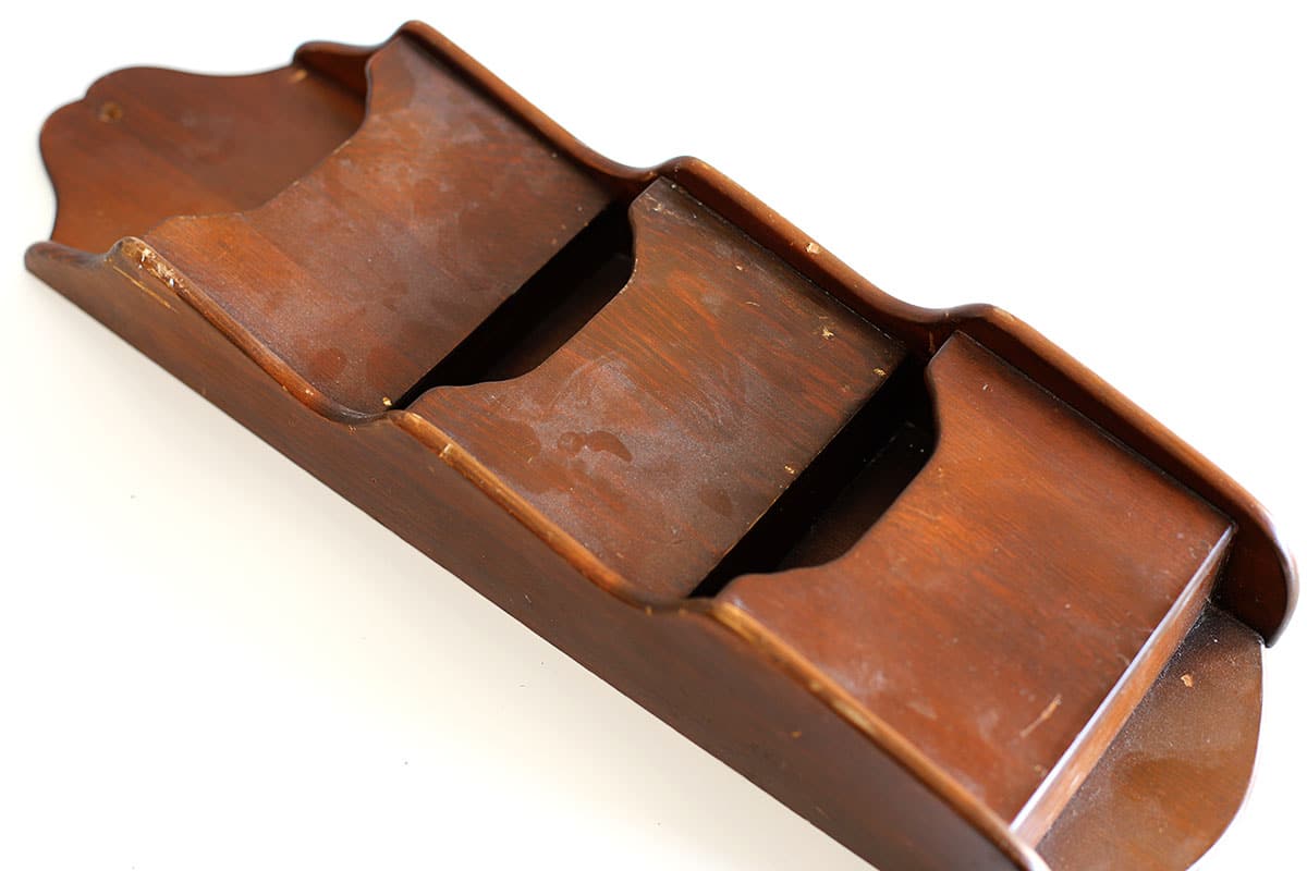 Dark wooden mail organizer from the 1980's.